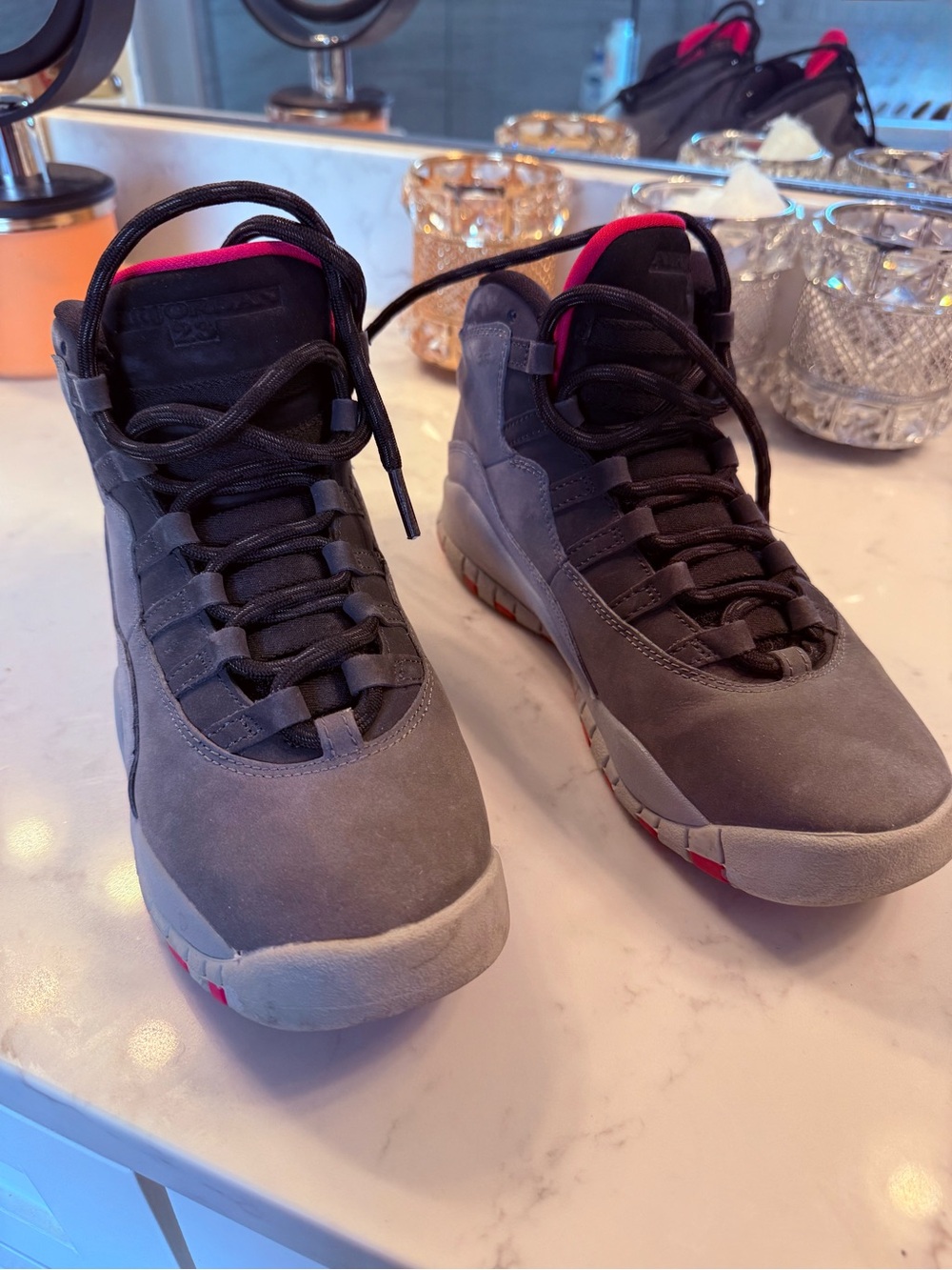 Gray Suede High-Top Jordans with Pink Accents